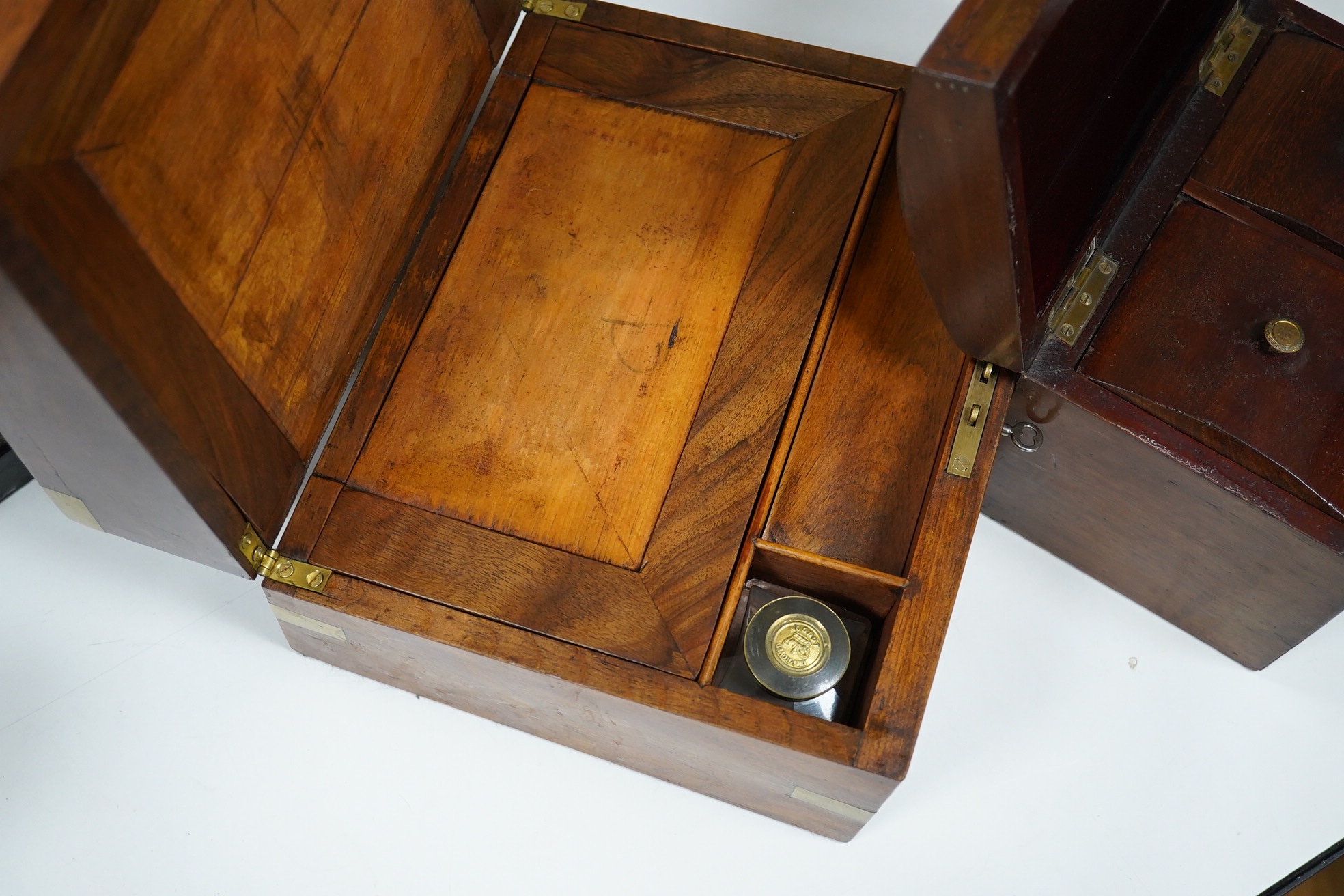 A Victorian brass bound walnut writing box and a mahogany tea caddy, largest 27cm wide. Condition - fair to good
